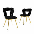 Set di 2 sedie in velluto nero con gambe in metallo dorato